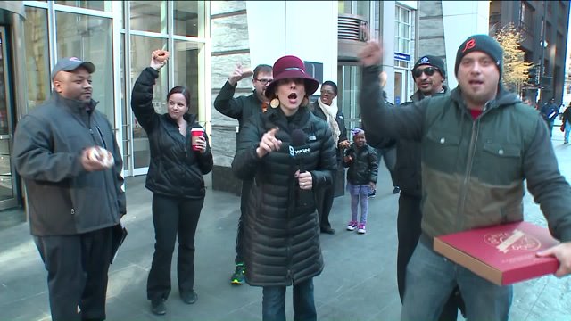 Ana hosts ‘Play That Tune’ game at the corner of Randolph and Clark