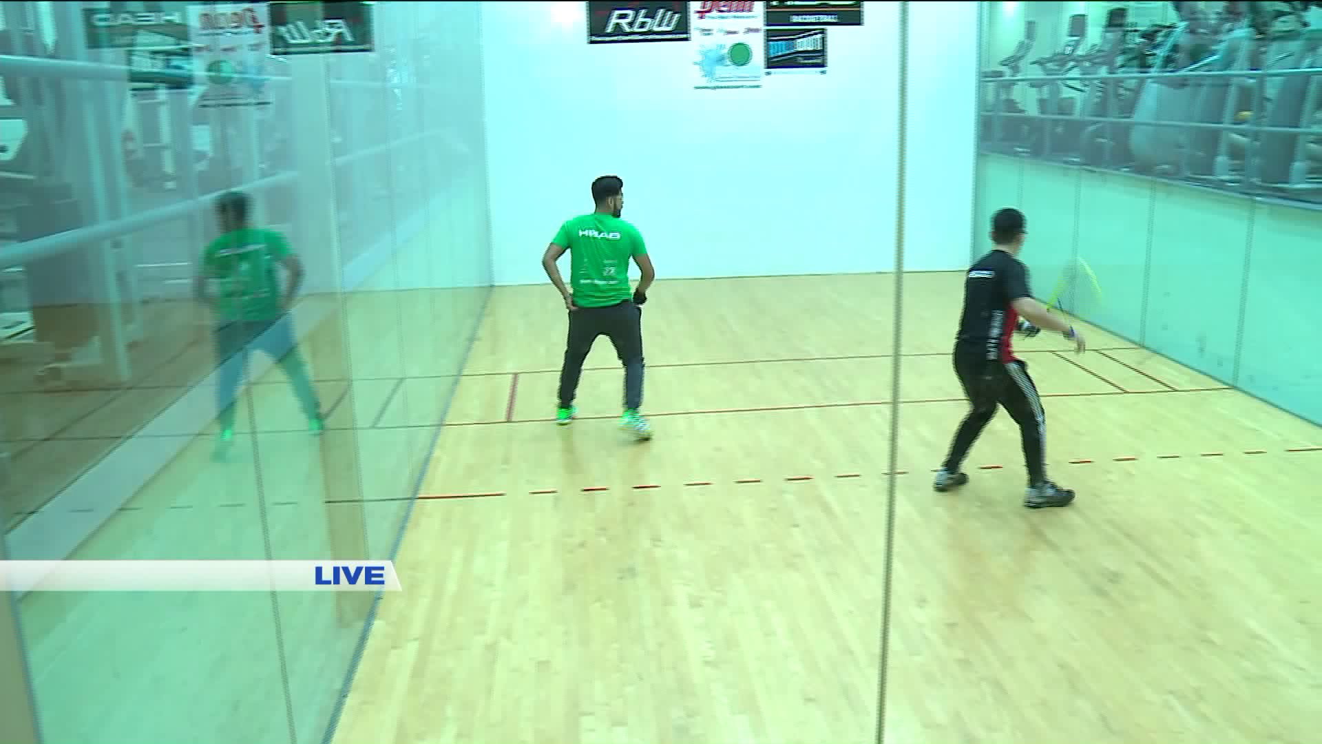 WGN reporter tries to learn racquetball in Lombard